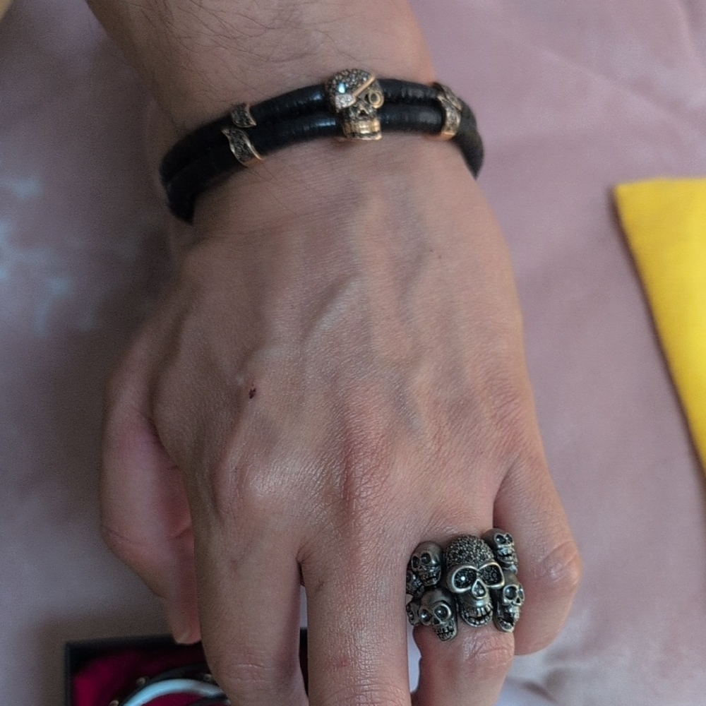 18k skull ring and bracelet with black diamonds